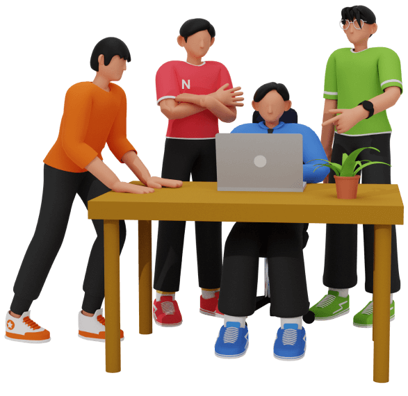A creative digital team collaborating around a laptop